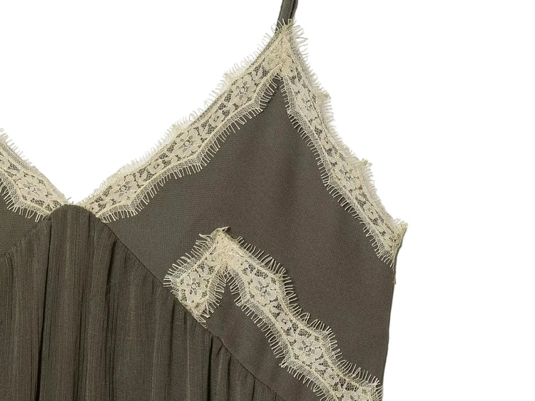 Green Brown dress with lace detailing on a white background