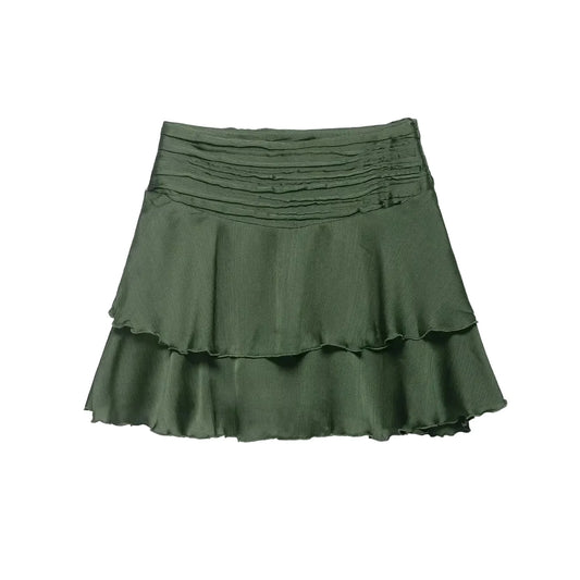 Green women's skirt with ruffled layers on a white background Spring