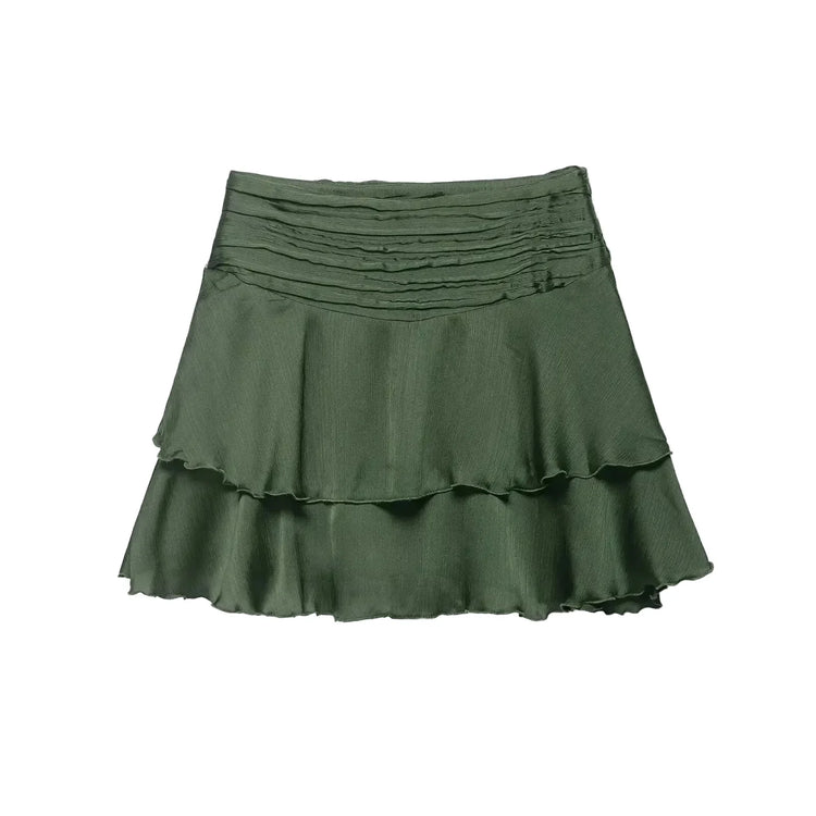 Green women's skirt with ruffled layers on a white background Spring