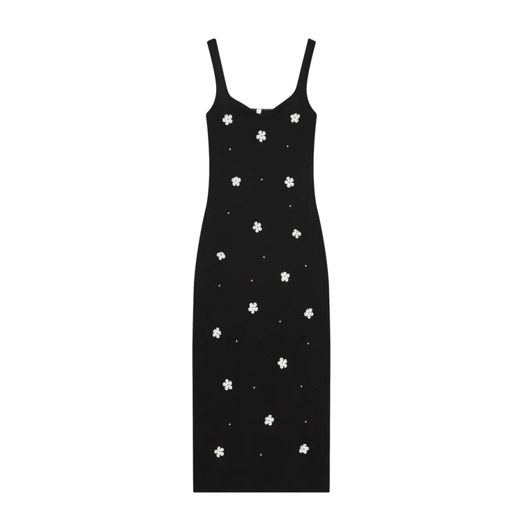 Black women's sleeveless dress with white floral patterns for Spring on a white background