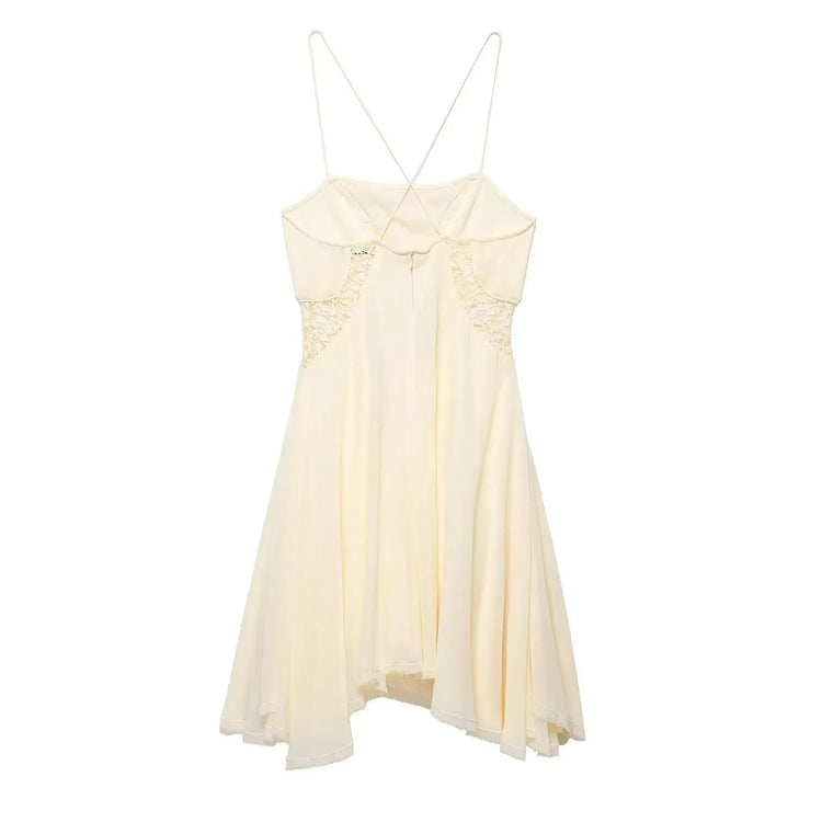 Cream-colored dress with thin straps on a white background