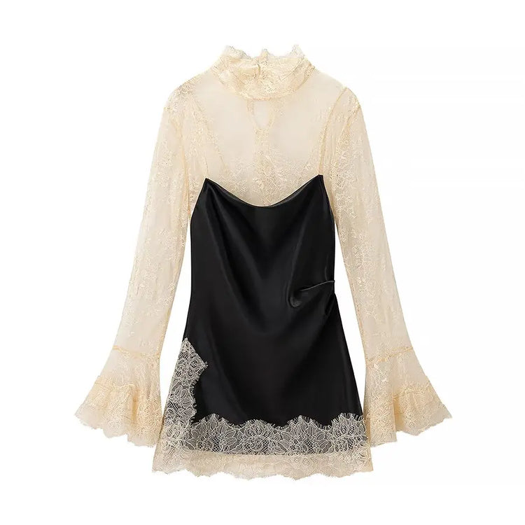 Two-tone dress with lace sleeves and hem on a white background