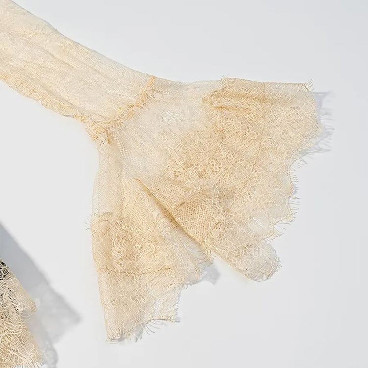 Beige lace fabric on a white background