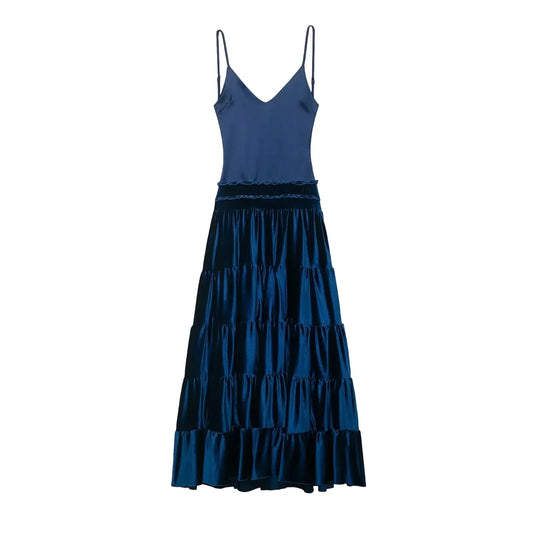 Blue tiered pleated sleeveless women's dress on a white background