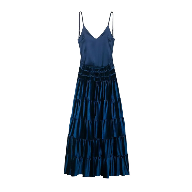 Blue tiered pleated sleeveless women's dress back on a white background