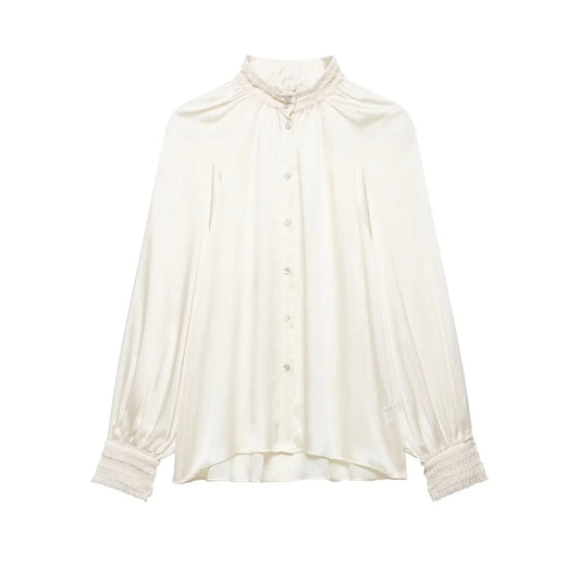 Women's spring satin white blouse on a white background
