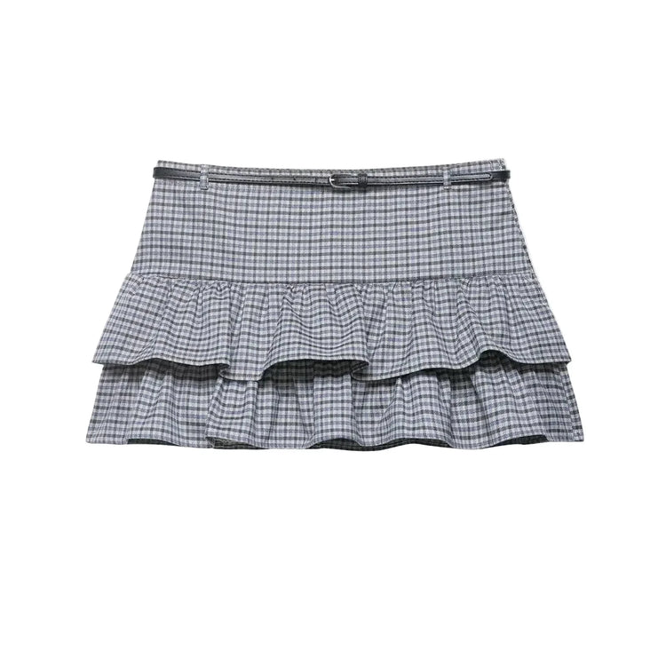 Plaid skirt with ruffled layers on a white background
