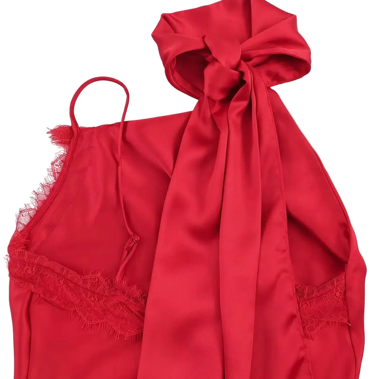 Red lace top with a matching red scarf on a white background