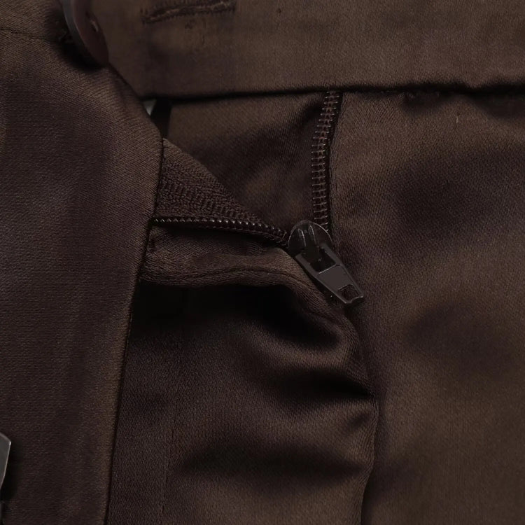 Close-up of a brown shorts with a zipper