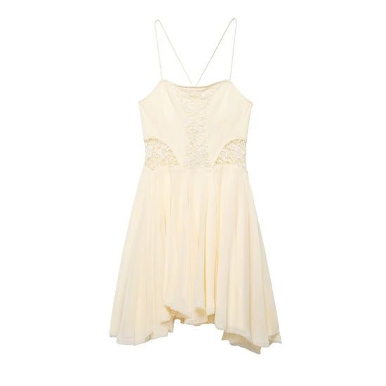 Cream-colored dress with lace and thin straps on a white background
