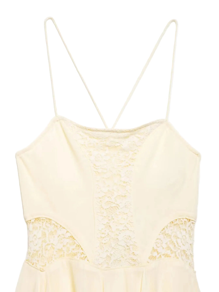 Beige lace dress with thin straps on a white background