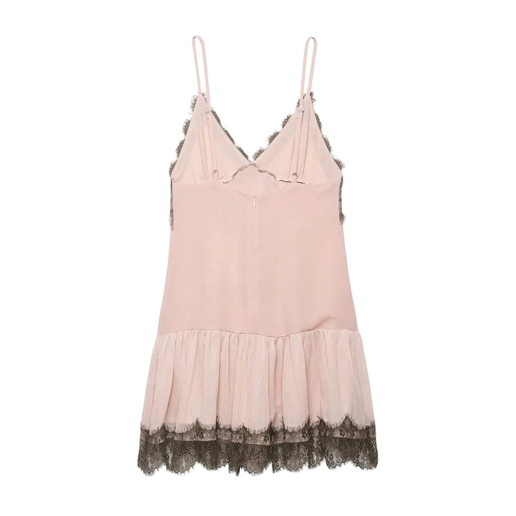 Pink slip dress with lace trim on a white background