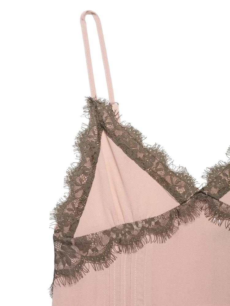 Pink dress with lace trim on a white background