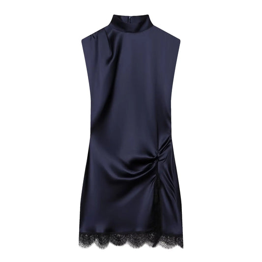 Navy blue dress with lace hem on a white background