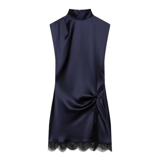 Navy blue dress with lace hem on a white background