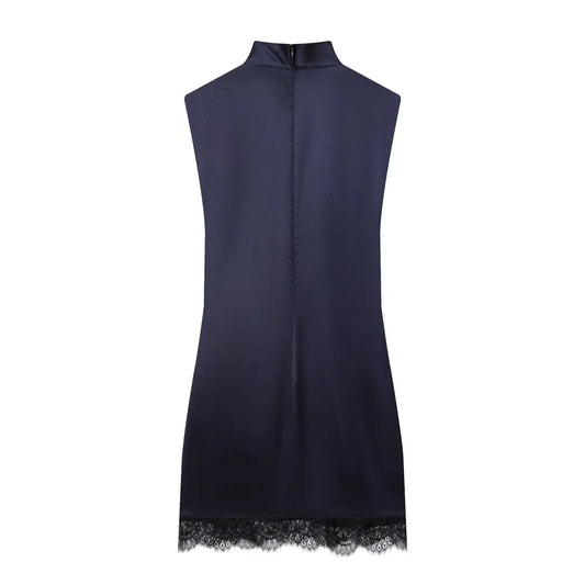 Navy sleeveless dress with lace trim on a white background