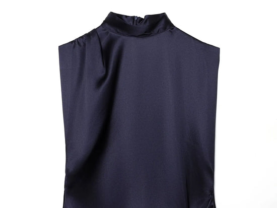 Navy sleeveless dress close up on a white background