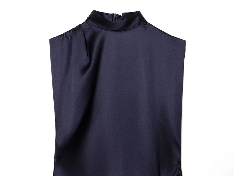 Navy sleeveless dress close up on a white background