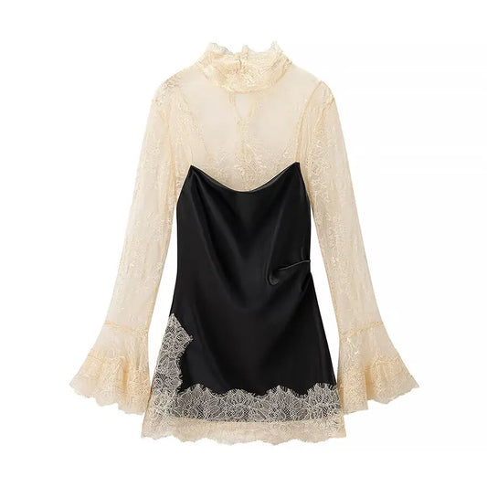Two-tone dress with lace sleeves and hem on a white background