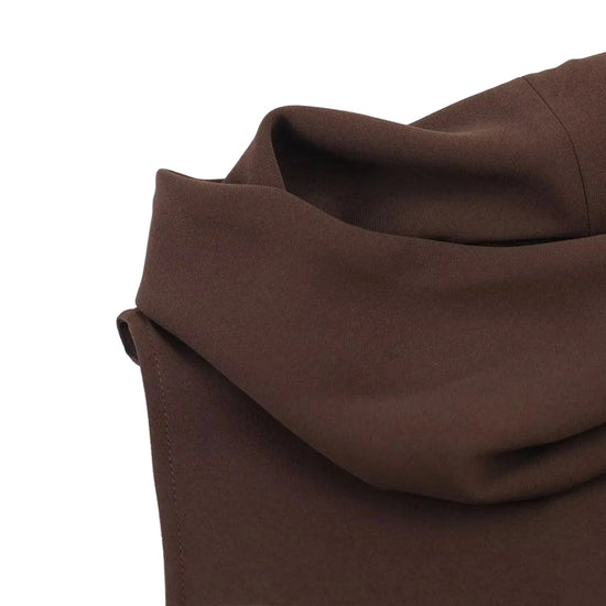 Close-up of brown fabric on a white background