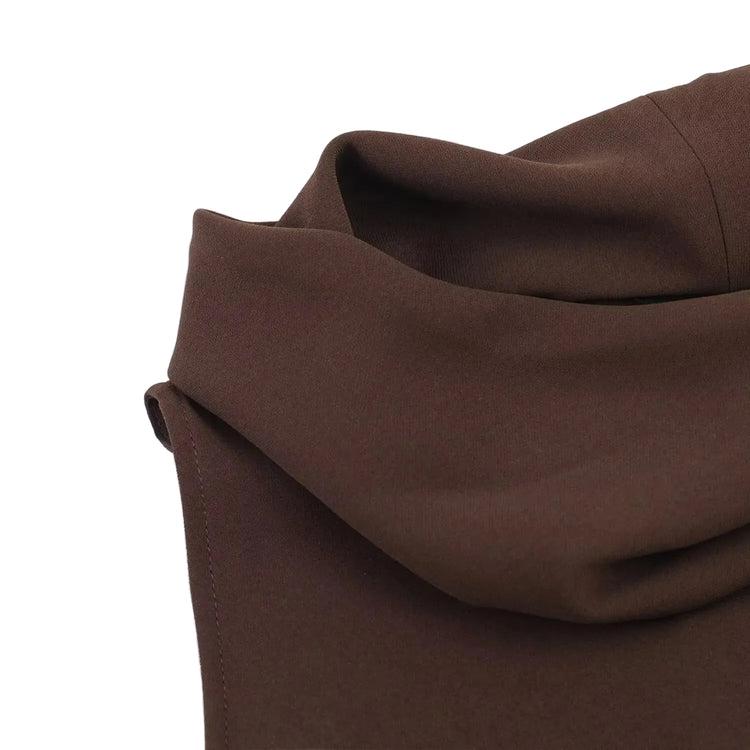 Close-up of brown fabric on a white background