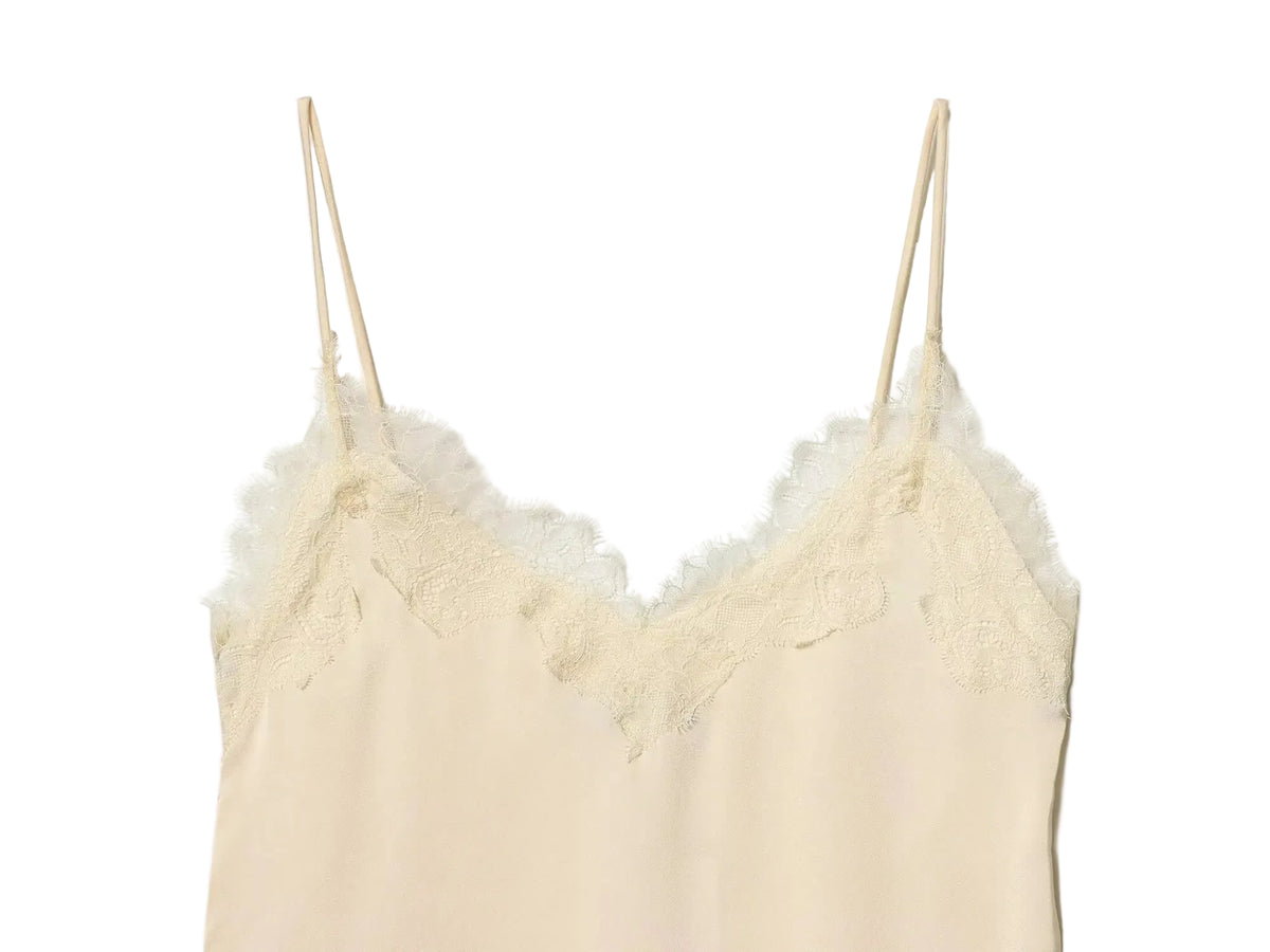 Cream-colored lace-trimmed camisole tank top close up