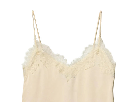 Cream-colored lace-trimmed camisole tank top close up