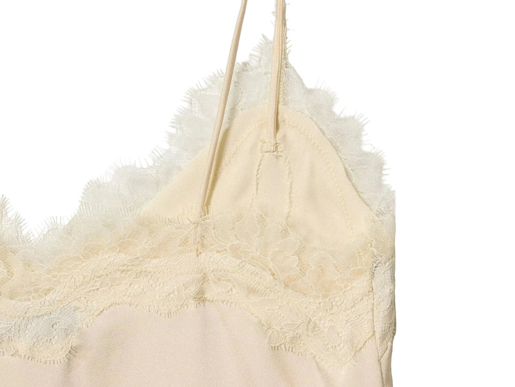 Cream-colored lace-trimmed camisole tank top close up