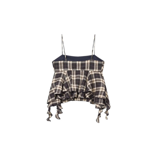 Plaid top with ruffled details on a white background