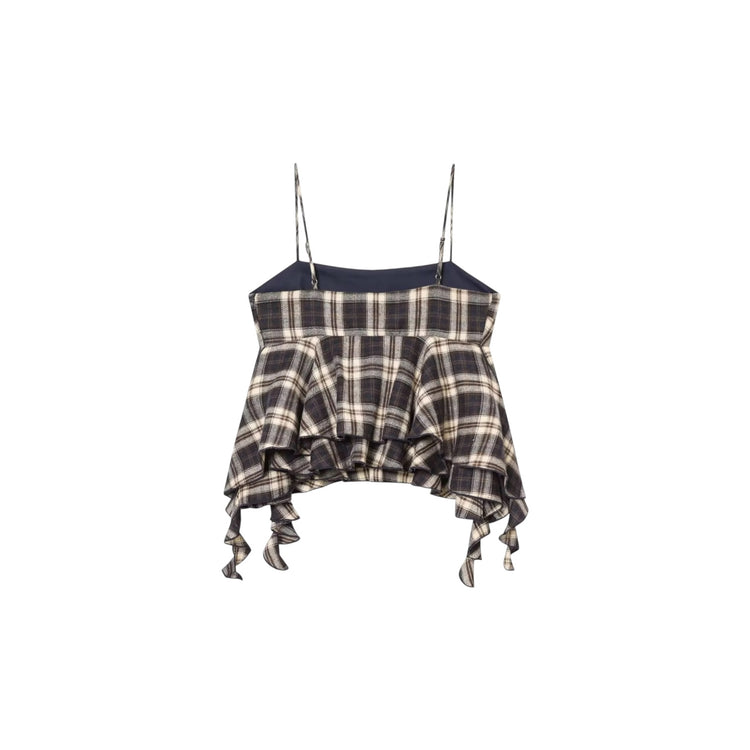 Plaid top with ruffled details on a white background