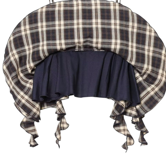 Plaid bonnet with navy blue ruffle on a white background