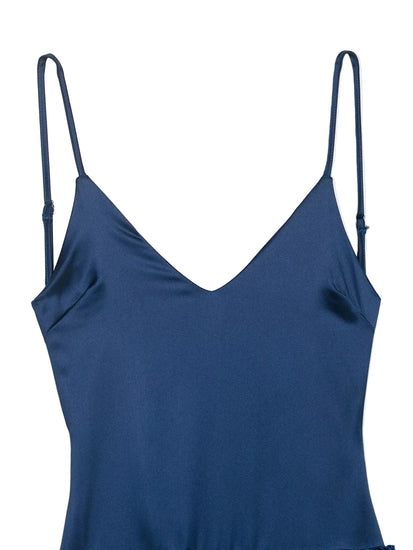 Blue dress close up of spaghetti strap women's dress on a white background