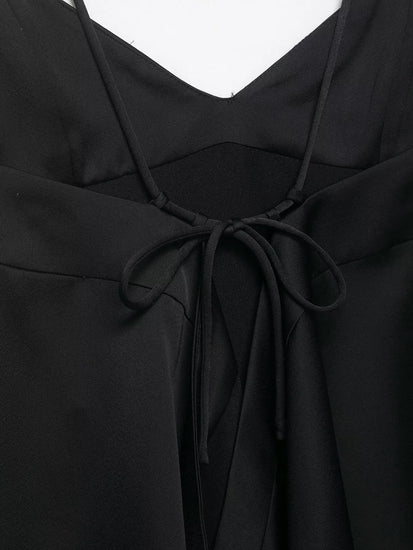 Black top with a tie detail on a white background
