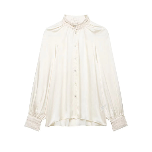 Women's spring satin white blouse on a white background