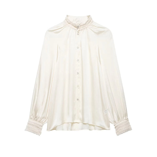 Women's spring satin white blouse on a white background