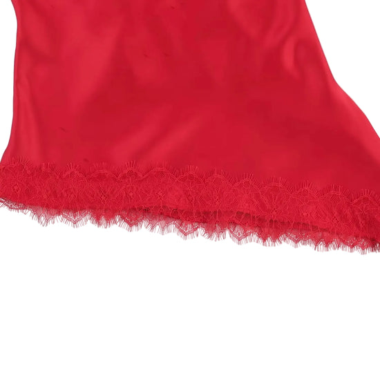 Red lace-trimmed garment on a white background